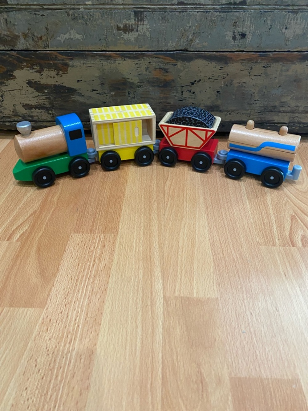 Melissa & Doug Wooden Multi-Car Train Set - Green, Yellow, Red, Blue - Ages 3+